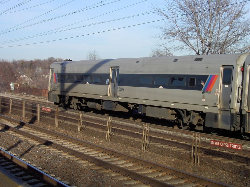 NJT Comet III Cab 5003 @ New Brunswick. Photo taken by Brian Weinberg, 3/14/2003.