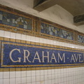 Wall tiles @ Graham Ave (L), front of Canarsie-bound platform. Photo taken by Brian Weinberg, 3/10/2004.