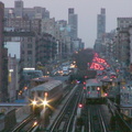 Two R-62A trains @ 125 St (1) on the Manhattan Valley viaduct. Photo taken by Brian Weinberg, 4/15/2004.