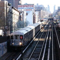 R-62A train @ south of 125 St (1) on the Manhattan Valley viaduct. Photo taken by Brian Weinberg, 4/16/2004.