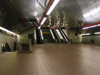 Looking west towards escalators on mezzanine one level above the platforms @ Roosevelt Island (F). Photo taken by Brian Weinberg