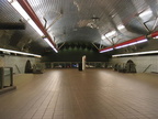 Looking east on mezzanine one level above the platforms @ Roosevelt Island (F). Photo taken by Brian Weinberg, 5/30/2004.