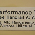 &quot;High Performance Vehicle. Please Use Handrail At All Times&quot; sign in San Diego Trolley Siemens-Duwag LRV #2004 @ Sante