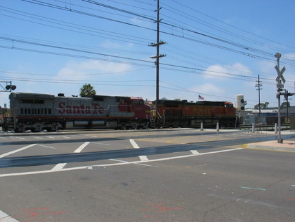 BNSF GE C44-9W 5240 (pumpkin) and 643 (warbonnet) @ Old Town station (San Diego). Photo taken by Brian Weinberg, 6/4/2004.