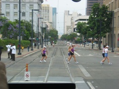 Runners in the Suzuki Rock 'n Roll Marathon crossing the tracks. The runners/joggers/walkers were then stopped to allow the LRV
