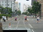 Runners in the Suzuki Rock 'n Roll Marathon crossing the tracks. The runners/joggers/walkers were then stopped to allow the LRV