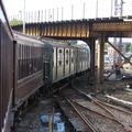 BU Gate Car 1407 &amp; R-1 100 @ Coney Island Yard. Photo taken by Brian Weinberg, 7/25/2004.