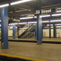 New staircase @ 59 St - Columbus Circle (NB Platform). Photo taken by Brian Weinberg, 8/22/2004.