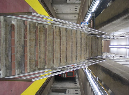 Staircase to the upper level at the SEPTA Broad Street Subway Pattison station (Lower Level). It was open because of an Eagles h