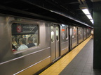 R-62 1588 snd R-62 1589 @ Times Square (3). These cars have bench seats. Photo taken by Brian Weinberg, 9/13/2004.