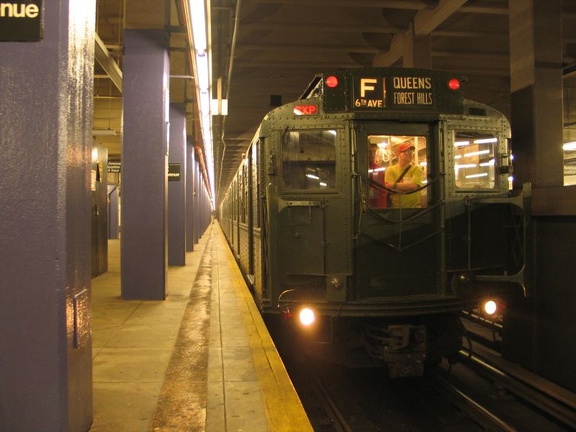 R-1 100 @ 2 Av (in service on the F line / Centennial Celebration Special). Photo taken by Brian Weinberg, 9/26/2004.