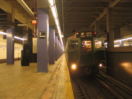 R-1 100 @ 2 Av (in service on the F line / Centennial Celebration Special). Photo taken by Brian Weinberg, 9/26/2004.