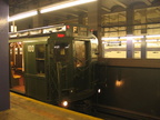 R-1 100 @ 2 Av (in service on the F line / Centennial Celebration Special). Photo taken by Brian Weinberg, 9/26/2004.