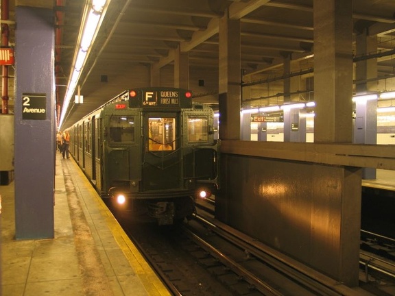 R-1 100 @ 2 Av (in service on the F line / Centennial Celebration Special). Photo taken by Brian Weinberg, 9/26/2004.