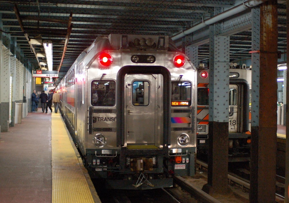 NJ Transit Multi-level Cab 7002 @ New York Penn Station (Inaugural Revenue Run). Photo taken by Brian Weinberg, 12/11/2006.