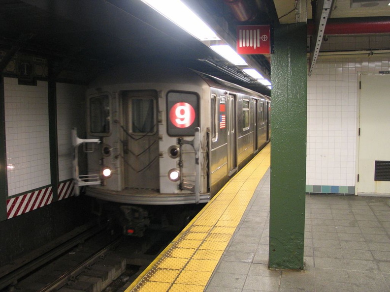 R-62A 2355 @ Times Square (9). This was the third-to-last southbound (9) train. As it came it, the T/O honked the horn at me. When he stopped the train, he yelled out the window that it was illegal to take photos of trains. He said I could only take photo IMG_3480.jpg