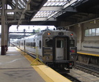 NJT Comet V Cab 6077 @ Newark Penn Station. Photo taken by Brian Weinberg, 7/17/2005.