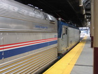 Amtrak AEM7 926 and baggage car 1711 @ Newark Penn Station. Photo taken by Brian Weinberg, 7/17/2005.