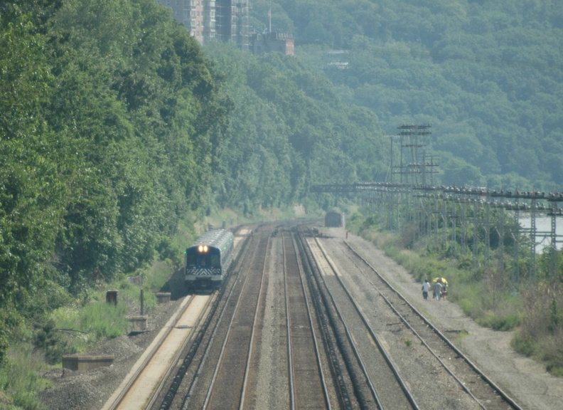 MNCR M7A @ Riverdale (MNCR Hudson Line). Note the trespassers on the west side of the tracks. Photo taken by Tamar Weinberg, 7/2