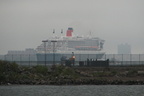 Queen Mary 2, departing NYC, as seen from Hoboken Terminal. Photo taken by Brian Weinberg, 9/14/2005.
