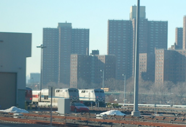 MNCR P32AC-DM locomotive sets and an M-2/4/6 set laid up @ Highbridge Yard while hundreds of people wait in the Bronx for trains to take them into Manhattan. Photo taken by Brian Weinberg, 12/21/2005. DSC_0696a.jpg