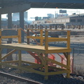 Temporary wooden boarding platform @ the Yankee Stadium Park &amp; Ride. Photo taken by Brian Weinberg, 12/21/2005.