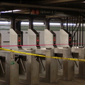 Fare Control @ 23 St & 6 Av (F/V). Turnstiles are taped off due to the TWU workers being on strike. The station entrances ar