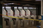 Fare Control @ 23 St &amp; 6 Av (F/V). Turnstiles are taped off due to the TWU workers being on strike. The station entrances ar