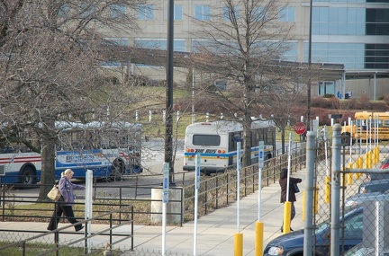 PG THE BUS and METROBUS @ New Carrollton (Orange Line). Photo taken by Brian Weinberg, 1/20/2006.