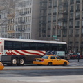 NYCT MCI Cruiser 2185 @ 23 St (X28). This is the 9-11-01 bus. Photo taken by Brian Weinberg, 1/25/2006.