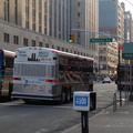 NYCT MCI Cruiser 2185 @ 23 St (X28). This is the 9-11-01 bus. Photo taken by Brian Weinberg, 1/25/2006.