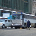 New York Airport Service (NYAS) MCI 102  @ 42 St & 5th Ave. Photo taken by Brian Weinberg, 2/13/2006.