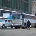 New York Airport Service (NYAS) MCI 102  @ 42 St &amp; 5th Ave. Photo taken by Brian Weinberg, 2/13/2006.