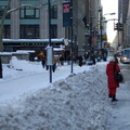 Bus stop covered in snow  @ 42 St & 5th Ave (M2, M3, M5). Photo taken by Brian Weinberg, 2/13/2006.