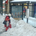 Snowed in bus shelter @ 34 St & 5th Ave. Photo taken by Brian Weinberg, 2/13/2006.