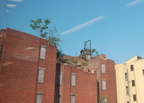 Run-down building near the Harlem-125th Street MNCR station. Is that an old elevator on top? Photo taken by Brian Weinberg, 6/30