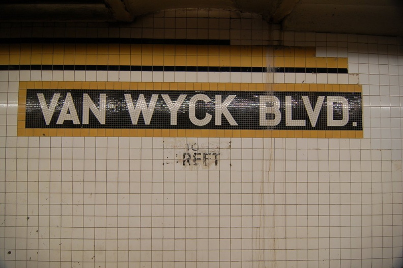 Briarwood - Van Wyck Blvd (E/F) - name tablet toward the middle of the Manhattan-bound platform. Photo taken by Brian Weinberg, 7/16/2006. DSC_4601.jpg