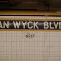 Briarwood - Van Wyck Blvd (E/F) - name tablet toward the middle of the Manhattan-bound platform. Photo taken by Brian Weinberg,