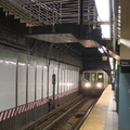 R-40 4285 @ Times Square - 42 St (W) - southbound platform, with the new staircase overhead.