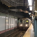 R-40 4285 @ Times Square - 42 St (W) - southbound platform, with the new staircase overhead.