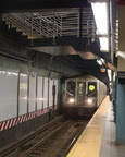 R-40 4285 @ Times Square - 42 St (W) - southbound platform, with the new staircase overhead.