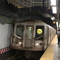 R-40 4285 @ Times Square - 42 St (W) - southbound platform, with the new staircase overhead.