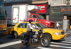 Suit on a motorcycle @ 23 St &amp; 6 Av. Photo taken by Brian Weinberg, 8/1/2006.