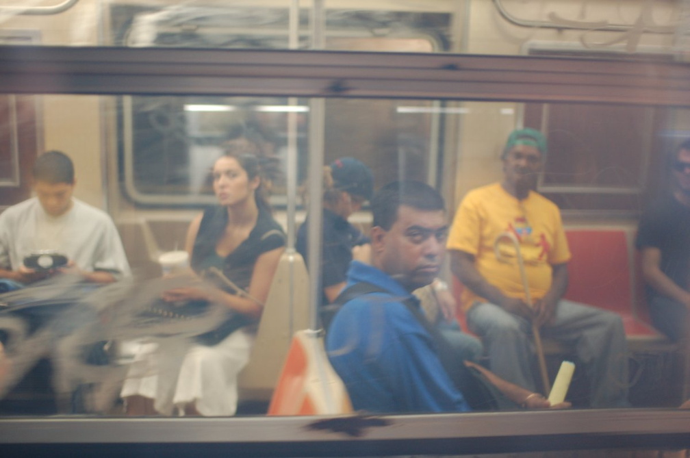 Passengers on an adjacent R-46 (R) train admiring R-160B 8713 @ Broadway BMT. Note: first revenue run of the R-160 fleet as part