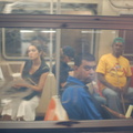 Passengers on an adjacent R-46 (R) train admiring R-160B 8713 @ Broadway BMT. Note: first revenue run of the R-160 fleet as part