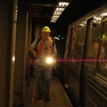 Subway signal maintainer who thinks 1050.9(c) does not apply to us @ 57 St - 7 av (Q). Photo taken by Tamar Weinberg, 8/20/2006.