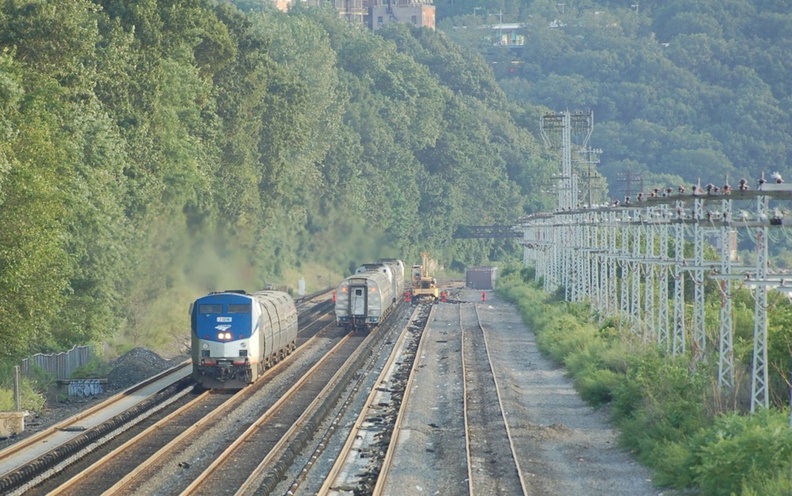 Amtrak P32AC-DM 704 @ Riverdale (Train 239). Amtrak train #242 is trailing train #284 on the southbound express track. Photo taken by Brian Weinberg, 9/4/2006. DSC_7524a.jpg