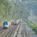 Amtrak P32AC-DM 704 @ Riverdale (Train 239). Amtrak train #242 is trailing train #284 on the southbound express track. Photo tak