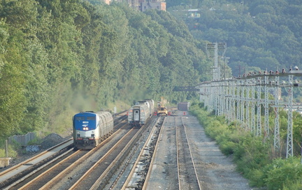 Amtrak P32AC-DM 704 @ Riverdale (Train 239). Amtrak train #242 is trailing train #284 on the southbound express track. Photo tak