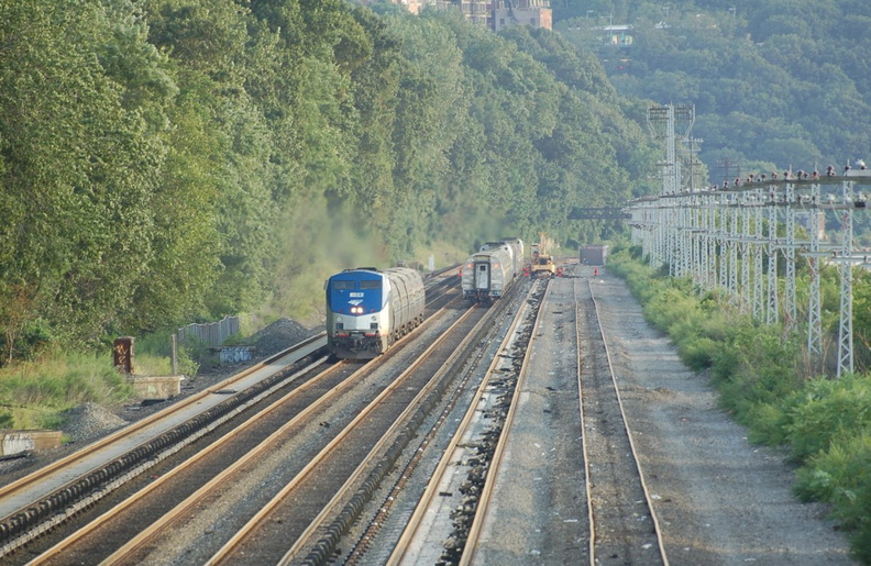 Amtrak P32AC-DM 704 @ Riverdale (Train 239). Amtrak train #242 is trailing train #284 on the southbound express track. Photo taken by Brian Weinberg, 9/4/2006. DSC_7525a.jpg